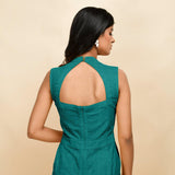 Back Detail of a Model wearing Pine Green 100% Linen Sleeveless Jumpsuit