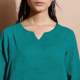 Front Detail of a Model wearing Pine Green Linen Split-Neck Straight Top