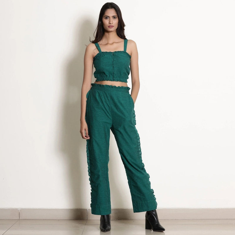 Front View of a Model wearing Pine Green Frill Warm Cotton Mid-Rise Paperbag Pant