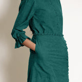 Front Detail of a Model wearing Pine Green Frilled Sleeve Button Down Top