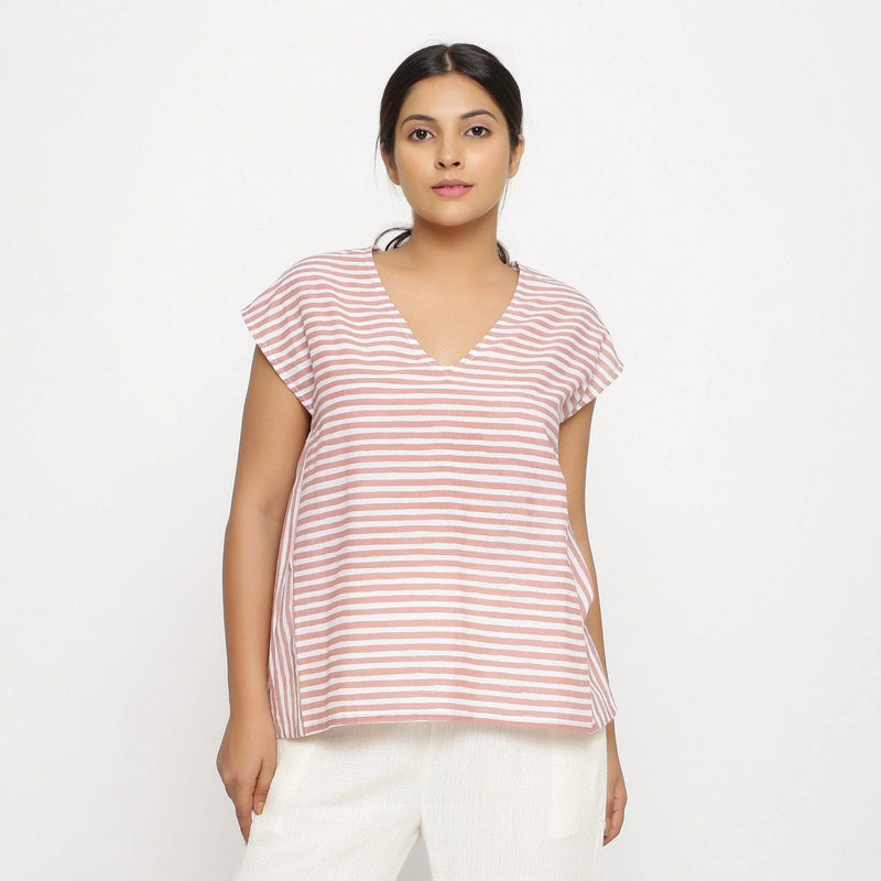 Front View of a Model wearing Pink And White Hand Screen Print Gathered Top