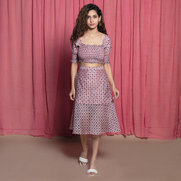 Front View of a Model wearing Chanderi Shirred Crop Top and Peplum Skirt Set