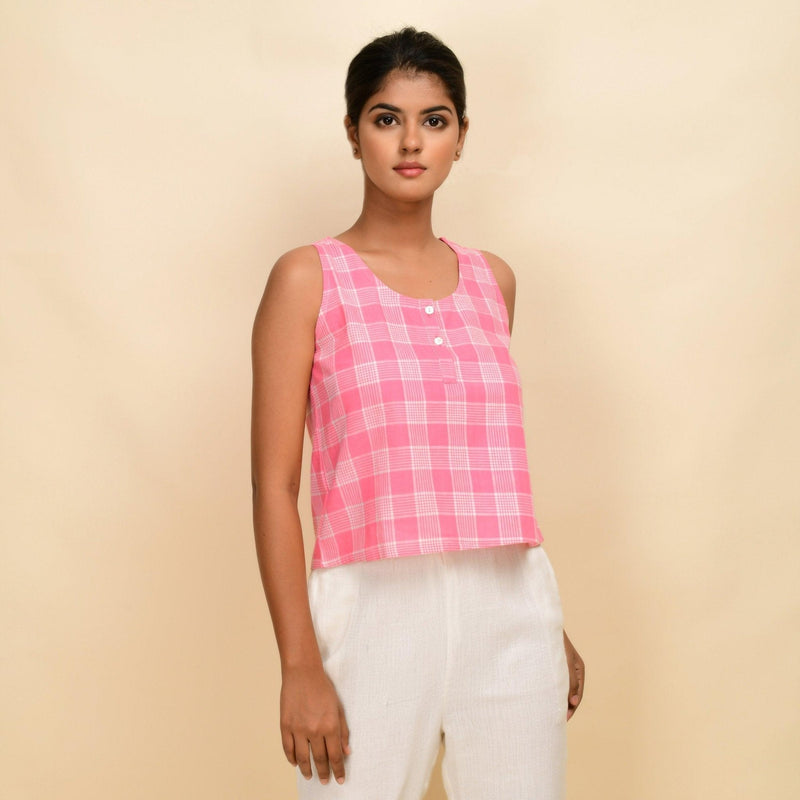 Front View of a Model wearing Pink Checks Cotton Muslin Sleeveless Short Top