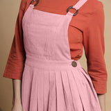 Front Detail of a Model wearing Pink Cotton Flax Pleated Knee Length Dress