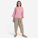 Front View of a Model wearing Pink Cotton Flax Round Neck A-Line Top