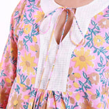 Front Detail of a Model wearing Pink Floral Print Frilled Sleeve Top