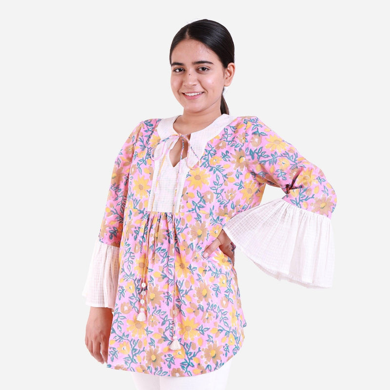 Front View of a Model wearing Pink Floral Print Frilled Sleeve Top