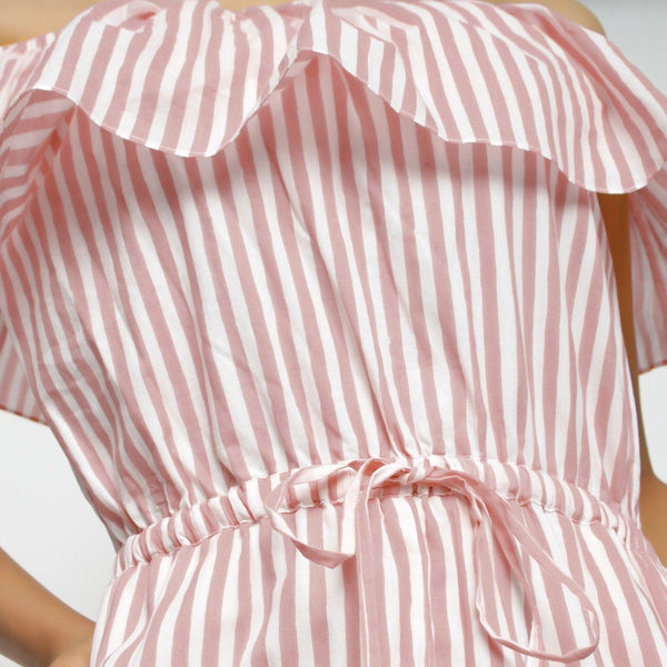 Front Detail of a Model wearing Pink Hand-Screen Print Playsuit