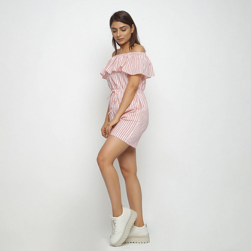 Left View of a Model wearing Pink Hand-Screen Print Playsuit