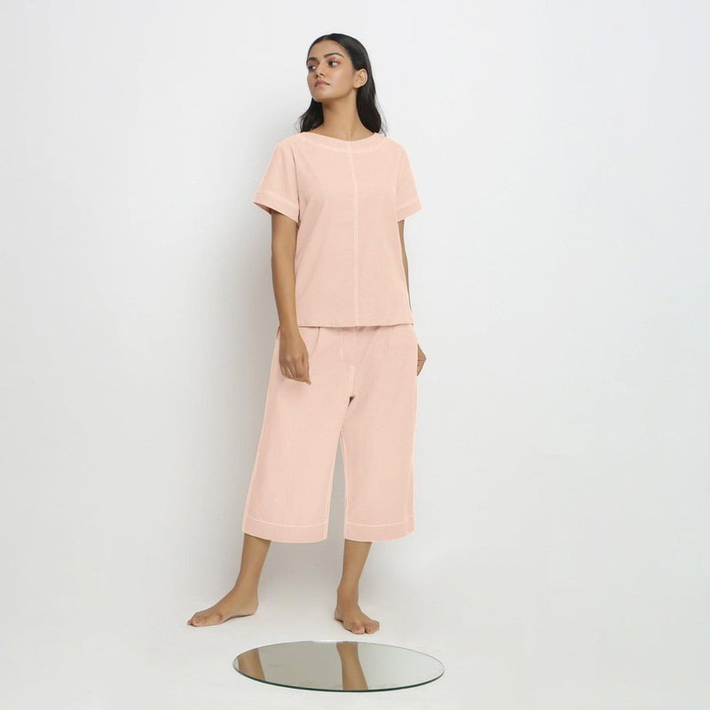 Front View of a Model wearing Pink Paneled Top and Mid-Rise Culottes Set