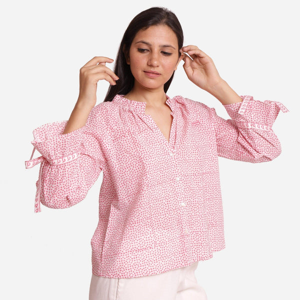 Right View of a Model wearing Pink Sanganeri Block Print V-Neck Blouse