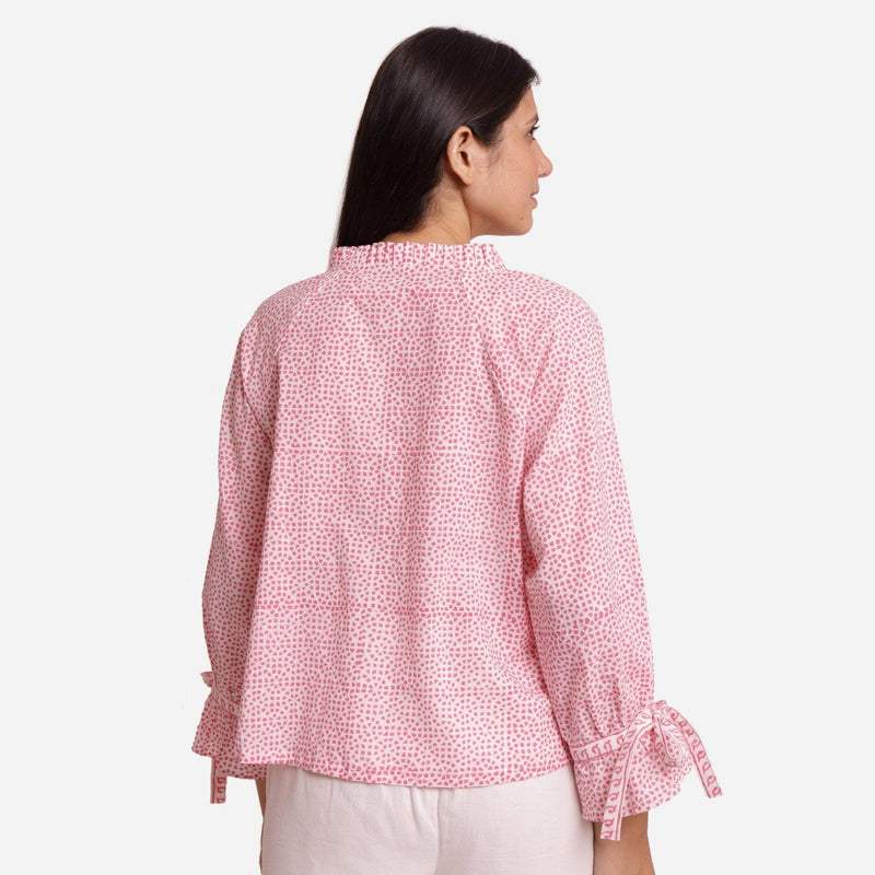 Back View of a Model wearing Pink Sanganeri Block Print V-Neck Blouse