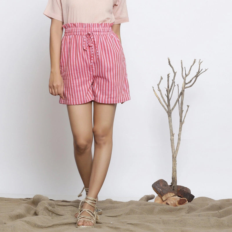 Front View of a Model wearing Pink Striped Handspun Paperbag Shorts