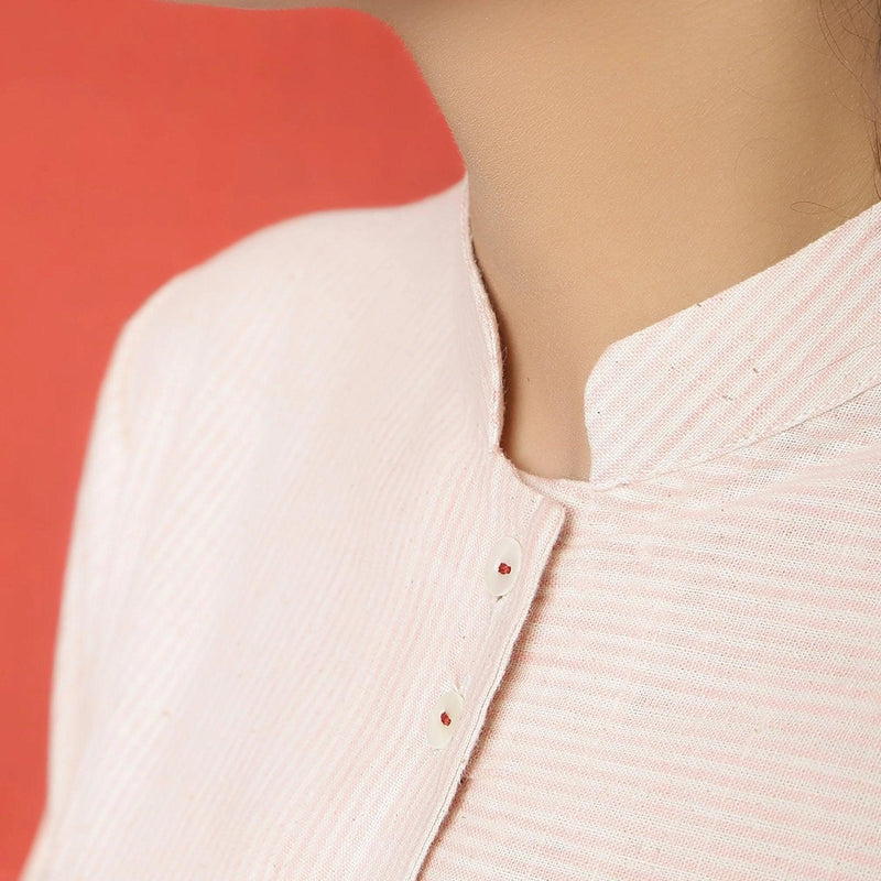 Close View of a Model wearing Pink Vegetable Dyed Button-Down Dress