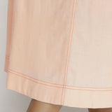 Close Detail of a Model wearing Pink Vegetable Dyed A-Line Paneled Dress