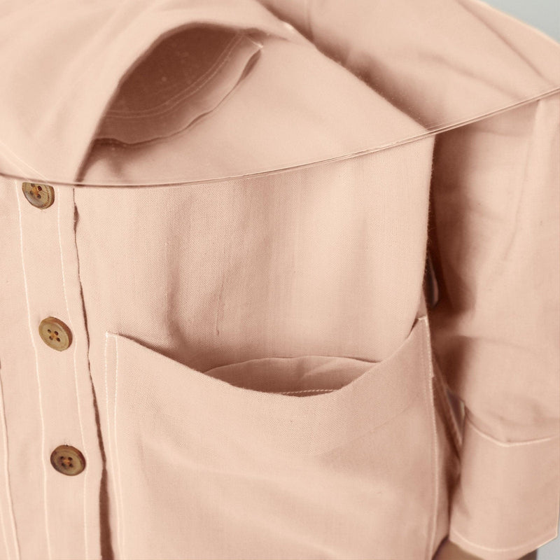 Front Detail of a Model wearing Vegetable Dyed Pink Button-Down Outerwear