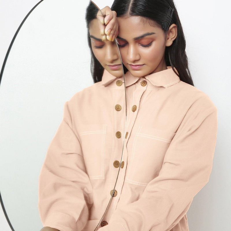 Front Detail of a Model wearing Vegetable Dyed Pink Button-Down Outerwear