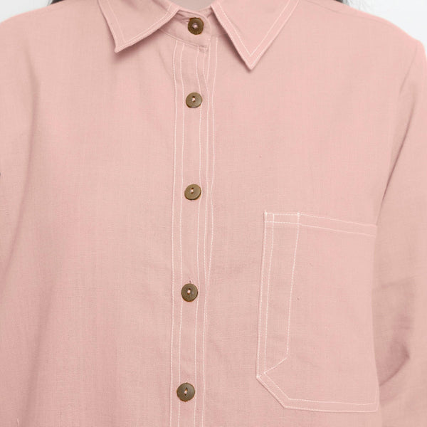 Front Detail of a Model wearing Vegetable Dyed Button-Down Pink Top