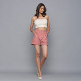 Front View of a Model wearing Pink Flannel Convertible Pant Shorts