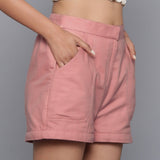 Right View of a Model wearing Pink Flannel Convertible Pant Shorts