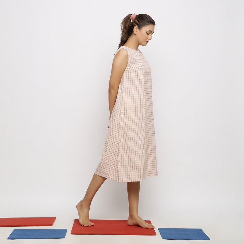 Right View of a Model wearing Vegetable Dyed Pink Paneled Dress