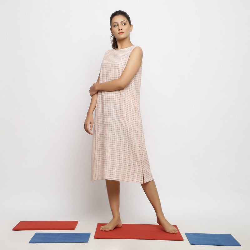 Left View of a Model wearing Vegetable Dyed Pink Paneled Dress