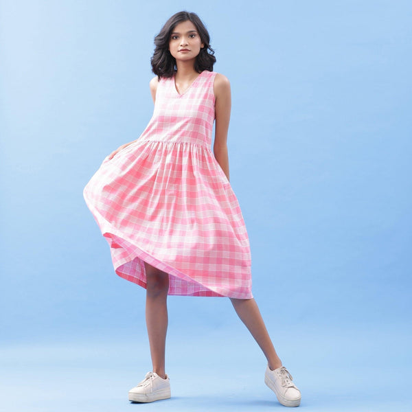 Front View of a Model wearing Handspun Cotton Pink Checks Yoke Dress