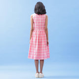 Back View of a Model wearing Handspun Cotton Pink Checks Yoke Dress