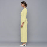 Left View of a Model wearing Pista Yellow Corduroy Comfy Jumpsuit