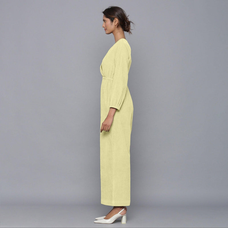 Left View of a Model wearing Pista Yellow Corduroy Comfy Jumpsuit