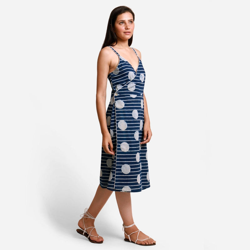 Right View of a Model wearing Polka Dot Block Printed Asymmetrical Cotton Midi Dress