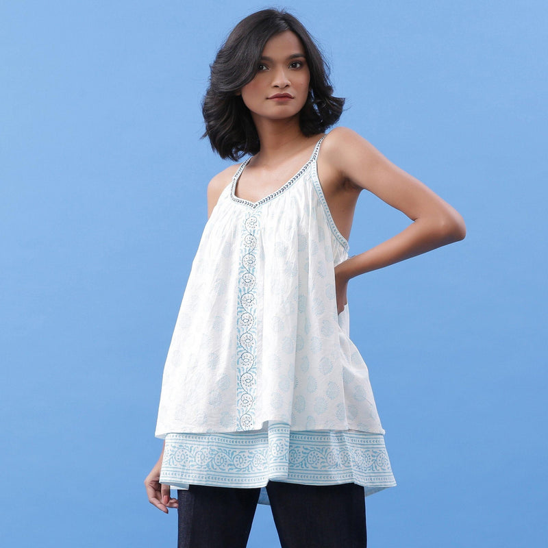 Front View of a Model wearing Powder Blue Block Printed V-Neck Tunic Top