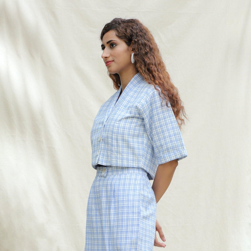 Left View of a Model wearing Powder Blue Checkered Handspun Cotton Short Jacket