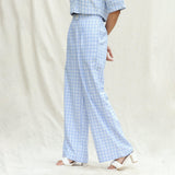 Left View of a Model wearing Powder Blue Checks Cotton High-Rise Wide Legged Pant