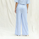 Back View of a Model wearing Powder Blue Checks Cotton High-Rise Wide Legged Pant