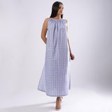 Front View of a Model wearing Powder Blue Checks Handspun Cotton Maxi Flared Dress