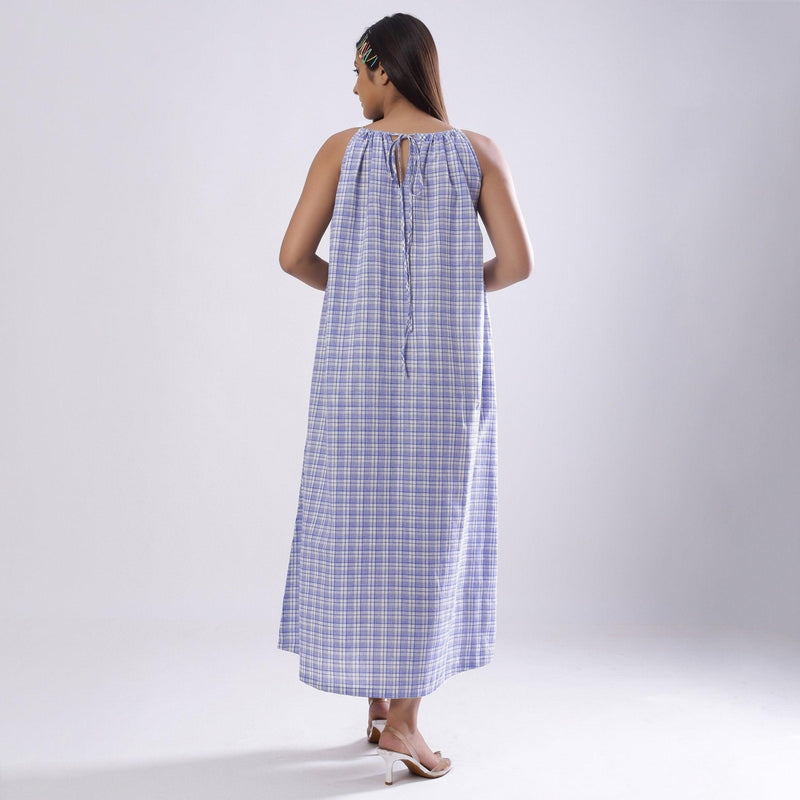 Back View of a Model wearing Powder Blue Checks Handspun Cotton Maxi Flared Dress