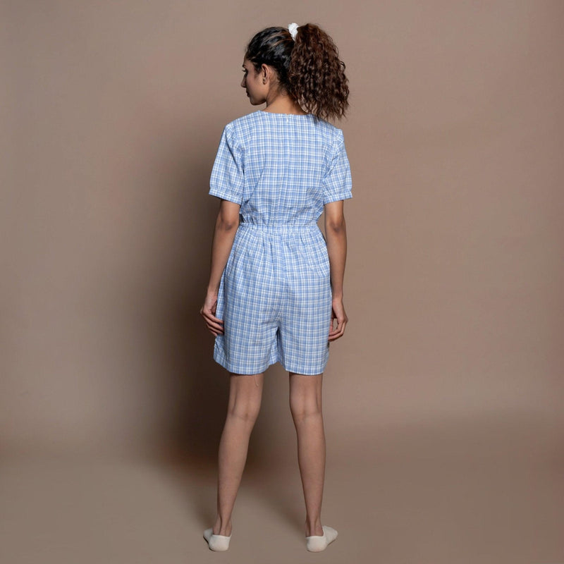 Back View of a Model wearing Powder Blue Checks Handspun Cotton Short Playsuit