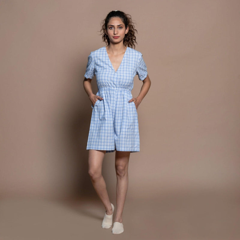 Front View of a Model wearing Powder Blue Checks Handspun Cotton Short Playsuit