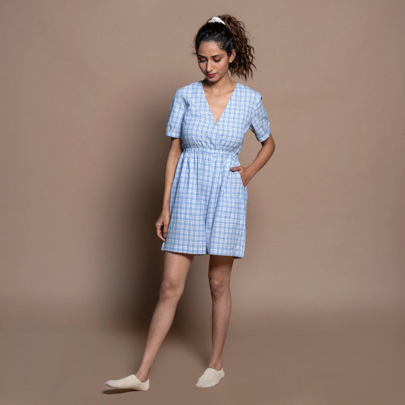 Front View of a Model wearing Powder Blue Checks Handspun Cotton Short Playsuit