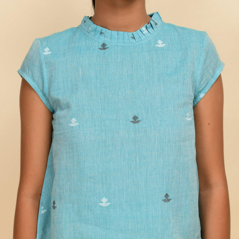 Front Detail of a Model wearing Powder Blue Cotton Muslin Jamdani Top