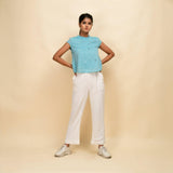 Front View of a Model wearing Powder Blue Cotton Muslin Ruffled Collar Jamdani Top