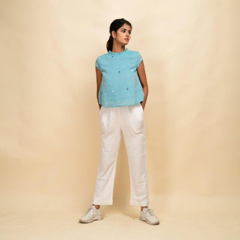 Front View of a Model wearing Powder Blue Cotton Muslin Ruffled Collar Jamdani Top