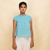 Front View of a Model wearing Powder Blue Cotton Muslin Jamdani Top