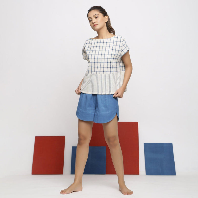 Front View of a Model wearing Blue Vegetable Dyed Straight Fit Shorts