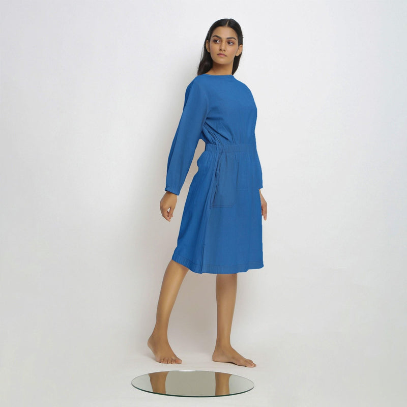 Right View of a Model wearing Vegetable-Dyed Blue 100% Cotton Dress