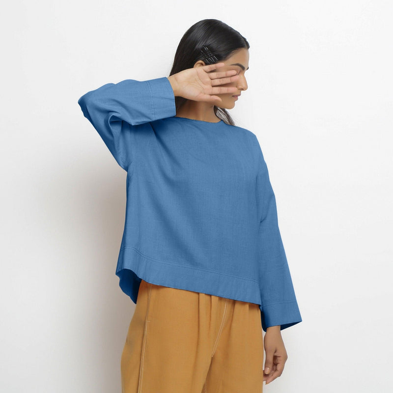 Front View of a Model wearing Vegetable-Dyed Blue 100% Cotton Straight Top