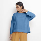 Front View of a Model wearing Vegetable-Dyed Blue 100% Cotton Straight Top