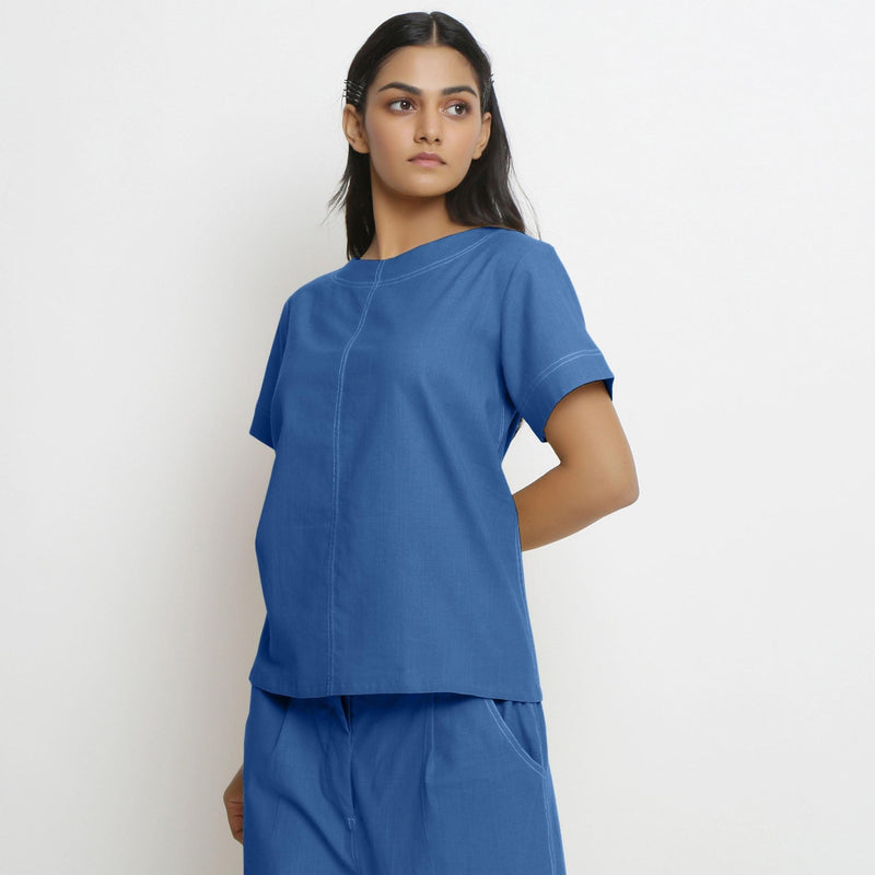 Left View of a Model wearing Blue Vegetable Dyed Paneled Top