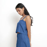 Left View of a Model wearing Vegetable-Dyed Blue 100% Cotton Spaghetti Top